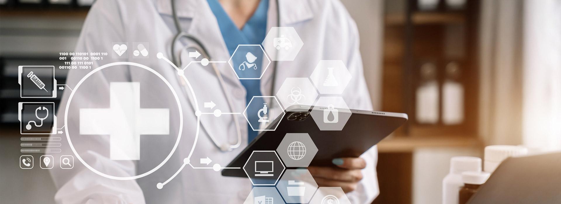 doctor with stethoscope looking at tablet