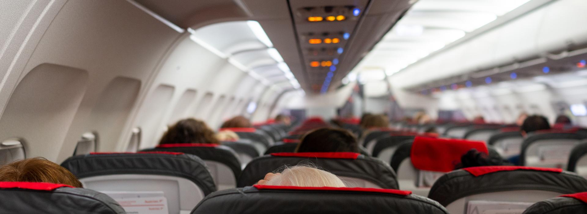 Interior of airplane with passengers
