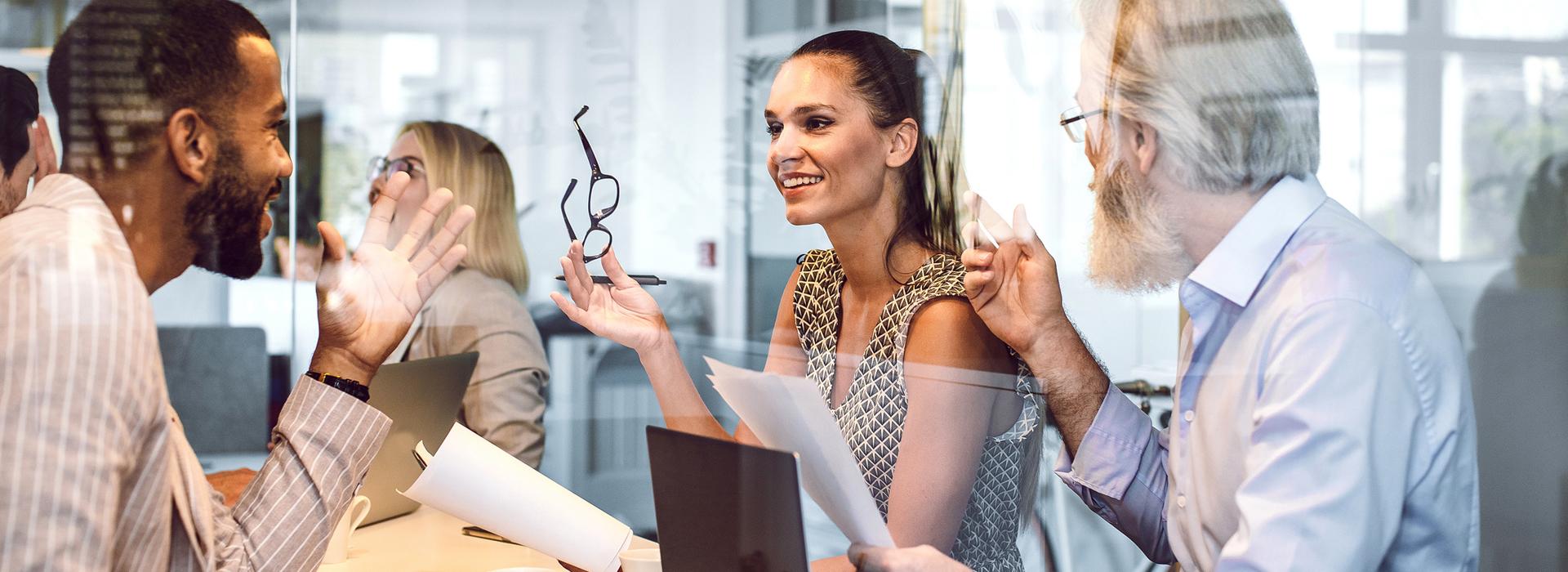 Business personnel conversing