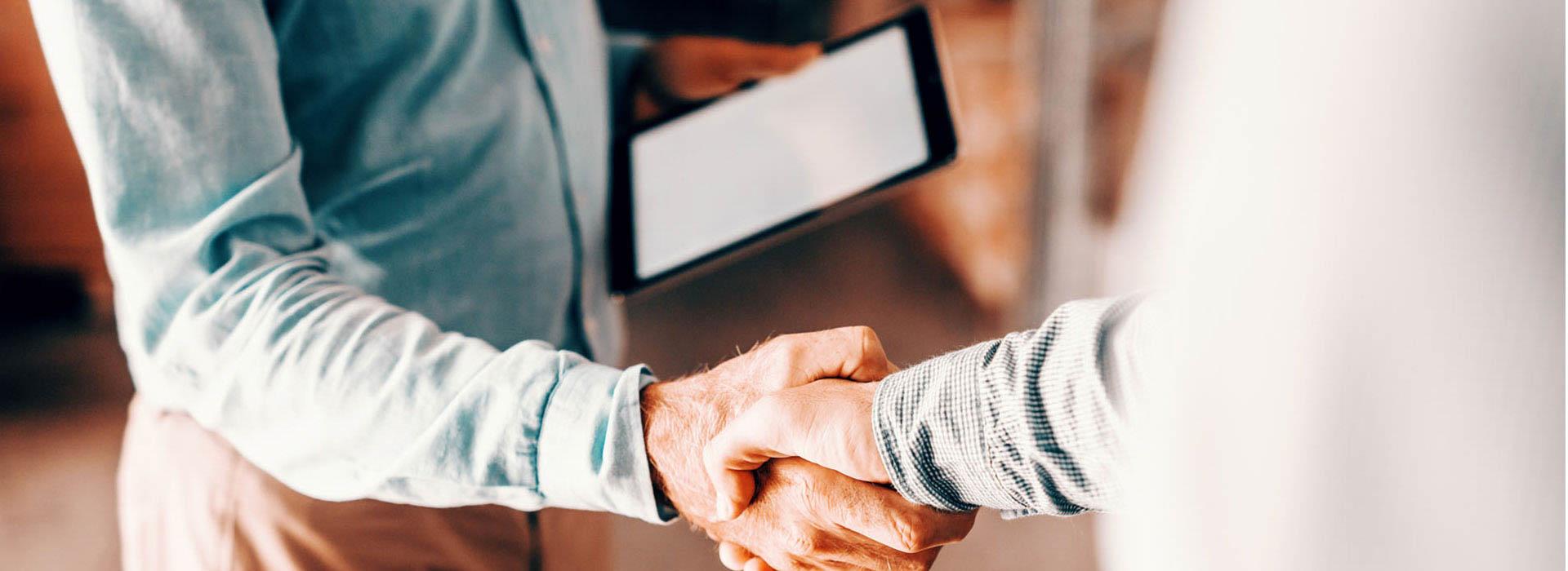 two guys shaking hands